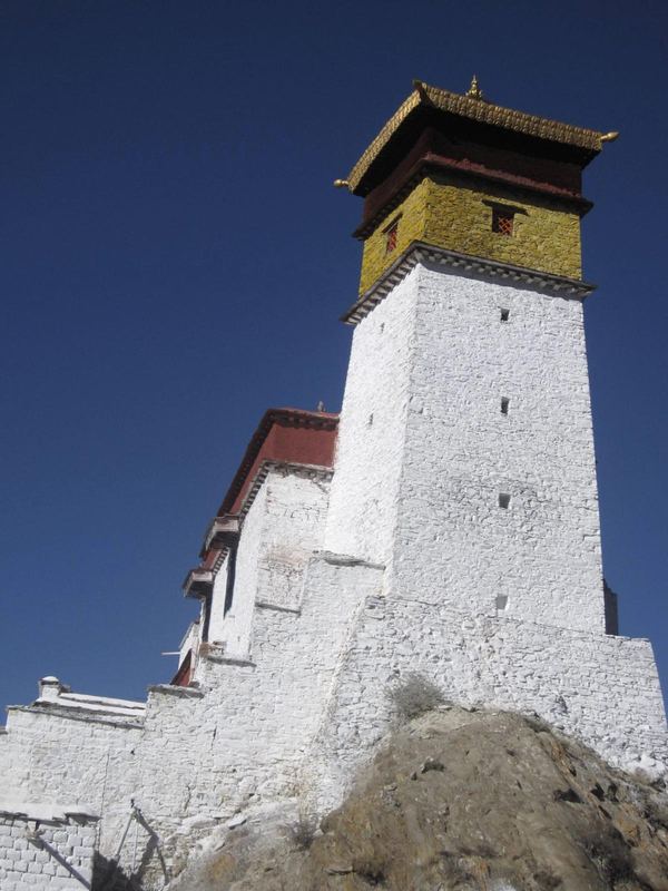 A whitewashed Tibetan fortress tower